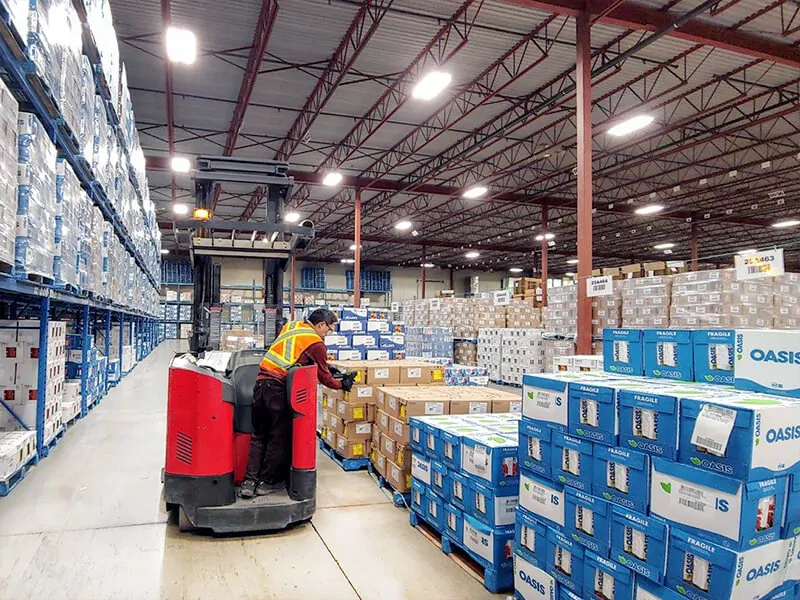 MTE employee doing pick pack order fulfillment on pick line at MTE Calgary warehouse
